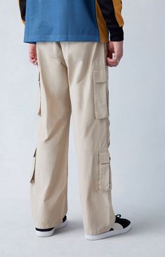 Add a fresh element to your look with the Tan Baggy Cargo Pants from PacSun. Designed to bring SoCal style to your rotation, these pants feature a drawstring waistline, hand pockets, dual cargo pockets at the legs, and pleating at the knee for added mobility. Embrace a relaxed fit that combines comfort and fashion for a versatile addition to your collection. Socal Style, Baggy Cargo Pants, Personal Marketing, Baggy Fits, Pacsun, Exclusive Collection, Cargo Pants, The Knee, Cool Style