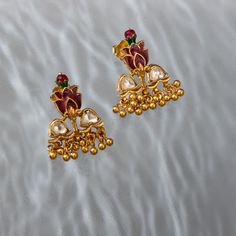 Introducing our beautiful collection of Lotus Studs, a symbol of purity, beauty, and enlightenment. Our Zuri Lotus Studs are meticulously crafted with the finest semi-precious stones and beads. They feature a delicate and minimalist design, with the lotus flower symbol in the center of the earring. Traditional Flower-shaped Jewelry For Diwali, Traditional Flower Jewelry For Diwali, Traditional Festive Jewelry With Natural Stones, Elegant Lotus Flower Jewelry Gift, Spiritual Jewelry With Natural Stones For Festive Occasions, Elegant Natural Stones Jewelry For Meditation, Elegant Natural Stone Jewelry For Meditation, Traditional Flower Shaped Jewelry, Traditional Festive Flower Jewelry