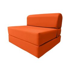 an orange couch sitting on top of a white floor