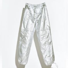 Genuine Zara New With Tag Material: Polyamide Color: Silver Lightweight & Comfortable Parachute Pants With Mid-Rise, Drawstring Elastic Waistband. Adjustable Drawstring Hem With Toggle. Love Metallic Silver Color. Casual Metallic Bottoms With Elastic Waistband, Metallic Wide Leg Pants For Summer, Metallic Wide Leg Summer Pants, Casual Metallic Bottoms With Pockets, Zara Summer Ankle-length Cargo Pants, Zara Parachute Pants, Parachute Trousers, Olive Green Cargo Pants, Flowy Wide Leg Pants