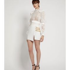 Zhivago Stretch Jersey Wrap Style Mini Skirt With Stitched Satin Waistband And Chain Feature On Hip. Nwt Size 4/Small Luxury Fitted Skirt, Luxury Fitted Mini Skirt, Elegant Mini Skirt For Cocktail Occasions, White Fitted Skirt For Cocktail, Luxury Fitted Cocktail Skirt, White Fitted Cocktail Skirt, Elegant White Mini Skirt For Evening, Luxury White Evening Skirt, Designer Fitted Summer Skirt