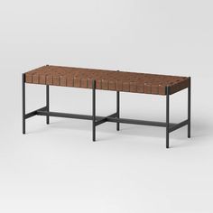 a bench made out of bricks and metal