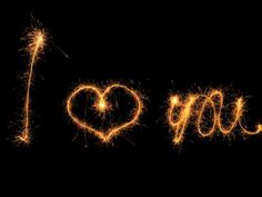 the word i love you written with sparklers