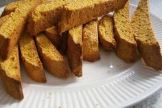 several pieces of bread on a white plate