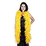 a woman in a black dress and yellow feather boa is standing with her hands on her hips