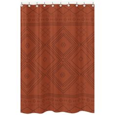 a shower curtain with an orange pattern on it