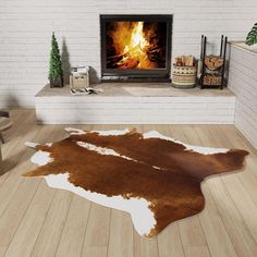 a living room with a fireplace and cowhide rugs on the floor in front of it