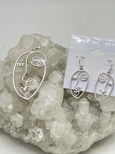 Abstract Face Pendant and Earring Set Pendant measures 2 1/8" long and 1 1/16" wide.   925 Sterling Silver Pendant Bail and Earwires  925 Sterling Silver Chain included  WWW.KARINSFORGOTTENTREASURES.COM Artsy Silver Earrings With Ear Wire, Artsy Silver Pendant Jewelry, Artsy Silver Metal Earrings, Artsy Sterling Silver Dangle Earrings, Artsy Sterling Silver Drop Earrings, Artsy Sterling Silver Jewelry With Artistic Design, Artsy Nickel-free Sterling Silver Earrings, Artsy Silver Pierced Earrings, Artistic Silver Drop Earrings