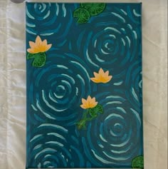 a painting with water lilies floating on top of it