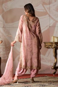 Pink kurta with cutdana cutwork embroidery. Paired with a dhoti pant, inner and embroidered dupatta. - Aza Fashions Raw Silk Unstitched Suit With Traditional Drape For Eid, Silk Salwar Kameez With Traditional Drape For Eid, Traditional Wear With Dabka In Tissue Silk, Eid Tissue Silk Churidar With Dabka Details, Diwali Tissue Silk Dupatta With Dabka, Chikankari Embroidery Raw Silk Salwar Kameez, Raw Silk Salwar Kameez With Sheer Dupatta, Traditional Drape Cotton Silk Salwar Kameez With Sheer Dupatta, Bollywood Style Tissue Silk Unstitched Suit With Dabka