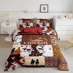 a bed covered in a colorful comforter and pillows