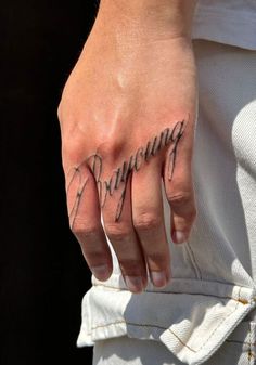 a woman's hand with writing on it and the word running written in cursive ink