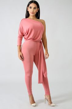 Our killer mauve jumpsuit will be sure to turn heads! Features a cold shoulder and a sash belt to hold on to your waist. Belted Jumpsuit, Belt Jumpsuit, Jumpsuits And Romper, Sash Belts, Sash Belt, Formal Wedding, Look Chic, One Shoulder Formal Dress, One Shoulder Dress