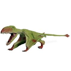 a toy dinosaur with its mouth open on a white background