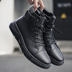 Casual Black Low-top Martin Boots, Casual Black Slip-on Martin Boots, Casual Black Martin Boots With Rubber Sole, Casual Black High-top Leather Shoes, Black Casual Leather Shoes For Streetwear, Casual Black Leather Shoes For Fall, Winter Leather Slip-on Sneakers, Leather Low-top Martin Boots With Rubber Sole, Black Leather Low-top Martin Boots