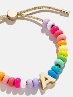 Shop the 
          Adjustable pull-tie bracelet 
        
Initial Beaded Slider Bracelet - Multi at the official Baublebar site. Excluded from Bracelet Offer. Colorful Beads Bracelet Jewelry For Friendship, Colorful Beaded Bracelet Jewelry For Friendship, Colorful Beads Friendship Bracelet, Colorful Beaded Friendship Bracelet, Beaded Bangle Jewelry For Friendship, Adjustable Bracelet With Colorful Beads, Adjustable Beaded Heishi Beads Bracelet, Colorful Beads Friendship Bracelets, Trendy Beaded Bracelet Jewelry