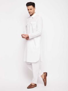 VASTRAMAY Men's White Cotton Blend Pathani Suit Set Elevate your ethnic look with this classic white Pathani suit set from VASTRAMAY. Crafted from a comfortable cotton blend, this set features a knee-length kurta with a mandarin collar, button placket, and long sleeves. The matching patiala pyjamas come with a relaxed drawstring waistband for ultimate comfort. Key Features White color Cotton blend material Includes Pathani Kurta and Salwar Comfortable fit Specifications Brand: VASTRAMAY Color: W Pathani Suit, Ethnic Looks, Suit Set, Drawstring Waistband, Mandarin Collar, Button Placket, Classic White, White Cotton, White Color