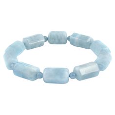 Discover the captivating beauty of natural aquamarine with this exquisite bracelet, designed to add a touch of elegance to any jewelry collection. Featuring untreated aquamarine beads, this bracelet showcases the serene blue hue and exceptional clarity that make aquamarine a highly sought-after gemstone. Center Stone: Aquamarine Quantity: Multiple Total Weight: 160.42 carats Treatments: None Shape: Barrel-shaped beads Stringing: Strong expandable silk thread Each aquamarine bead is expertly shaped into a barrel form, enhancing the stone's natural brilliance and depth. Strung on a durable, expandable silk thread, this bracelet offers both comfort and flexibility, making it perfect for any wrist size. With a total weight of 160.42 carats, this bracelet is a testament to the timeless allure o Aquamarine Bracelet, Diamond Free, Modern Bracelets, Ruby Beads, Aquamarine Beads, White Gold Bracelet, Thread Bracelets, Aquamarine Stone, Aquamarine Blue