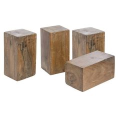 three pieces of wood sitting next to each other