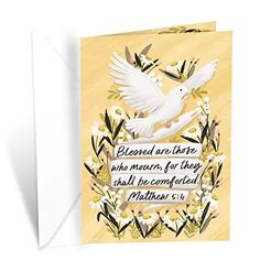 a greeting card with a dove and flowers on the front, which reads, blessed are there who means for they shall be created