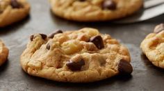 chocolate chip cookies on a baking sheet ready to be eaten