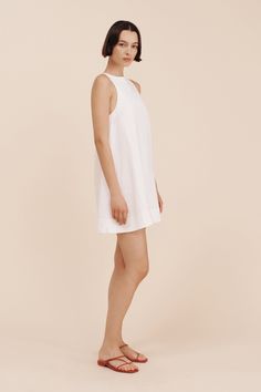 Classic and chic, the Poppy dress is a shift style dress that will work for a number of occasions. Cut from our signature linen, it features a high neck and has an A-line silhouette that makes it so flattering on. Wear yours anywhere from the beach to afternoon drinks to Sunday brunch. High neckline A-line silhouette Keyhole opening at centre back neck Relaxed fit Cotton lining Material: 100% Linen Made in India Poppy Dress, Sunday Brunch, High Neckline, Strappy Sandals, Style Dress, Body Measurements, Shift Dress, Poppies, The Beach