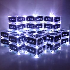 a bunch of cubes that are lit up with lights