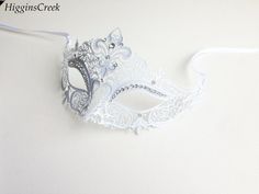 Elegant White Masquerade Mask For Weddings, Elegant White Wedding Masquerade Mask, White Wedding Eye Mask, White Eye Mask For Wedding, White Mardi Gras Masks And Prosthetics For Gift, Elegant White Costume Mask, White Mardi Gras Masks And Prosthetics, White Masks And Prosthetics For Mardi Gras Gift, White Eye Mask For Masquerade