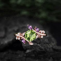 "This is a Hexagon 6x6mm  1ct natural  peridot engagement ring in solid gold,  The accent stones are natural amethyst and diamonds or moissanites. The band width is about 1.3mm. It can be made in any ring size. However please contact me to custom make it to a special big or small size. It can be made in white gold,rose gold or yellow gold with 14k or 18k. However for some people who are nickel allergic,I can also make it to 925 sterling silver to make you can wear it. The ring is handmade,very high quality! 30 days money back guarantee. Returns & Warranty 30-Day money back guarantee (starting from the day of delivery). \"Made to Order\" purchases qualify for our 30-day money back guarantee. The 30-day money back guarantee gives you time to make sure your purchase is perfect. If you need to Amethyst And Peridot Engagement Ring, Amethyst And Peridot Ring, Green Amethyst Promise Ring In Fine Jewelry Style, Green Emerald Cut Amethyst Ring For Anniversary, Green Emerald-cut Amethyst Ring For Anniversary, Green Emerald-cut Amethyst Ring For Wedding, Emerald Cut Peridot Gemstone Jewelry, Wedding Emerald Cut Green Amethyst Ring, Wedding Green Emerald-cut Amethyst Ring