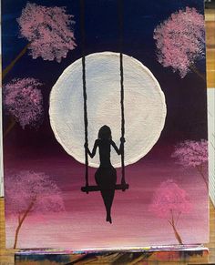 a painting of a woman sitting on a swing in front of the moon and trees