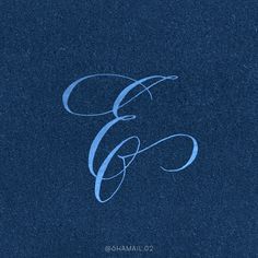 the letter e is made up of blue paper and has a handwritten font on it