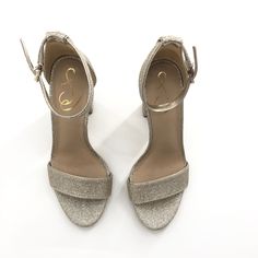 Sam Edelman Yaro Heel in JuteSize 7Color Metallic SilverPrelovedGently Worn indoorsWebsite DetailsTextile upper with leather soleImportedAnkle strap with buckle closureReflective detail throughoutApprox 100mm/ 4 inch heelRevolve Style No. SAME-WZ833Manufacturer Style No. E8511FQ2621431 Sam Edelman, 4 Inch, Buckle, Heels, Leather, Blue