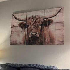 a cow's head is displayed on the wall