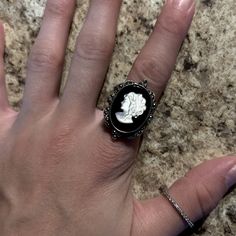 Barley Used/I’ve Had For Years. Perfect Condition. Marked Su Onyx Cameo Marcasite / Opal Carved Cameo W Onyx & Marcasite Sterling Silver Size: 6.75 Black Cabochon Jewelry For Wedding, Black Cabochon Wedding Jewelry, Black Round Cameo Jewelry, Black Cameo Ring As Gift, Black Cameo Ring For Gift, Formal Black Cameo Jewelry, Black Cameo Jewelry For Collectors, Collectible Black Cameo Jewelry, Mother Of Pearl Ring