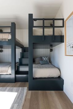 the bunk beds are built into the side of the wall to make it look like they're floating