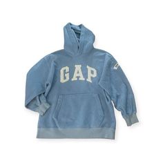 This vintage GAP hoodie sweatshirt is a must-have for any Y2K enthusiast. The light blue fleece fabric provides warmth and nostalgia, while the pullover style and unisex XL size make it a versatile addition to any wardrobe. The hoodie features the iconic GAP logo and is made with high-quality materials, ensuring both durability and style. Whether you're looking to relive the early 2000s or simply add a unique piece to your collection, this hoodie is the perfect choice. Vintage Y2K Light Blue GAP Light Blue Sweatshirt With Ribbed Cuffs For Streetwear, Light Blue Fleece Sweatshirt For Streetwear, Light Blue Hooded Sweatshirt With Letter Print, Light Blue Hoodie With Letter Print For Winter, Light Blue Letter Print Winter Hoodie, Winter Light Blue Hoodie With Letter Print, Light Blue Fleece Sweatshirt With Drawstring Hood, Light Blue Hooded Sweatshirt With Kangaroo Pocket, Light Blue Fleece Sporty Sweatshirt