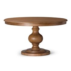 a round wooden table with two pedestals on the top and one leg raised up