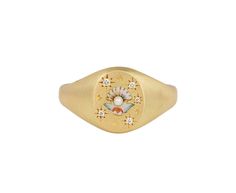 With its stunning details and subtle sparkle, this Cece Jewelry ring is a sweetly feminine take on the traditional signet ring. The matte 18K yellow gold oval ring face has been delicately painted with a tiny Champlevé enamel clam shell and set with five tiny star set diamonds. A small white pearl sits at the center of the clam adding the perfect touch of whimsy. The composition is set at the center of the matte 18K yellow gold band. 18K yellow gold and enamel ring face : just under 1/2" x 3/8"d Oval Enamel Signet Ring As Gift, Oval Enamel Signet Ring For Gift, Oval Gold Enamel Ring In 14k Gold, Gold Oval Enamel Ring With Cabochon, Gold Oval Enamel Ring, Elegant Yellow Gold Enamel Signet Ring, Yellow Gold Oval Enamel Ring For Gift, Oval Enamel Ring For Wedding, Oval Yellow Gold Enamel Ring For Gift