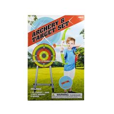 an advertisement for archery and target set in the grass with a young boy standing next to it