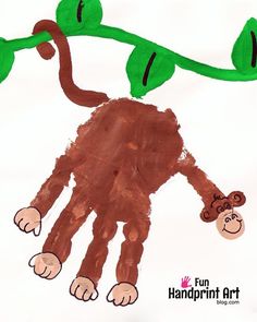 a child's drawing of a monkey hanging from a tree branch