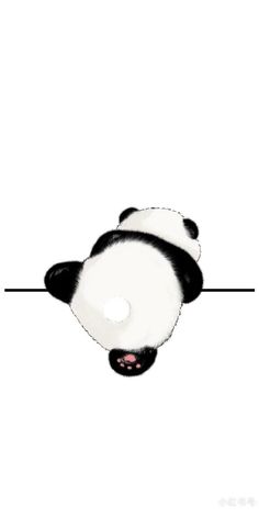 a panda bear is laying down on the ground with its head tilted to the side