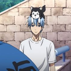 an anime character with blue hair and a cat on his head standing in front of a brick wall