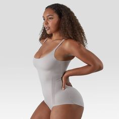 SCULPTED TO PERFECTION Get the smooth and sleek look you want under clothes with this Modern Sculpts women's bodysuit. Designed with bonded layers of compression, this flattering bodysuit gives lightweight but supportive extra firm control. A Stay Put Promise bottom band combined with mesh inserts allows you to move comfortably throughout the day. Plus, innovative Cool Comfort moisture-wicking technology works to keep you cool and comfy - no matter what the day brings. With adjustable, convertib Solid Full Coverage Second-skin Shapewear, Full Coverage Second-skin Shapewear, Compressive Shapewear With Built-in Bra, Second-skin Shapewear With Full Coverage, Solid Second-skin Shapewear Full Coverage, Second-skin Full Coverage Shapewear, High Stretch Full Coverage Bodysuit, Compressive Solid Shapewear With Lined Body, Sleek Second-skin Shapewear