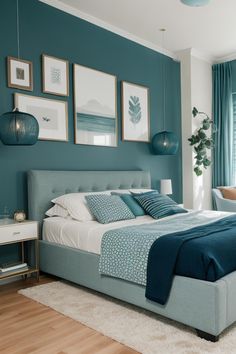 a bedroom with teal walls and white carpeted flooring is pictured in this image