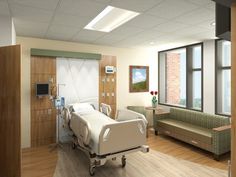 an empty hospital room with medical equipment in it