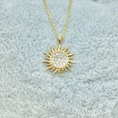 - Sun necklace is made with high-quality 14K solid gold. - Dainty, delicate and trendy glowing sun sunburst Necklace pendant necklace has been artfully designed for stylish women. - You receive sun jewelry in a beautiful and free gift box. - Free shipping (Arrive within 4 business days to USA and Canada ( 1 day for production + 3 days for shipment)) - 14K real solid gold glowing sun necklace is a perfect and special gift for women, mother, girlfriend, wife, daughter, colleagues and of course for Gold Hypoallergenic Necklace For Her, Hypoallergenic Yellow Gold Necklace With Round Pendant, Hypoallergenic Round Gold-plated Necklaces, Sun Pendant Gold, Gold Sun Necklace, Sunburst Necklace, Sun Jewelry, Necklace Sun, Sunshine Necklace