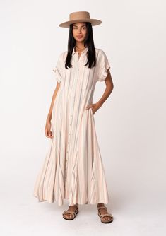 Shop this flowy boho button-front maxi dress in a multi-color neutral stripe. With side pockets. Designed in LA, under $100! Casual Vertical Stripes Maxi Dress For Beach, Casual Maxi Dress With Vertical Stripes For The Beach, Casual Striped Maxi Dress For The Beach, Beach Striped Short Sleeve Maxi Dress, Spring Vertical Stripes Maxi Dress, Spring Maxi Dress With Vertical Stripes, Striped Flowy Maxi Dress For Spring, Short Sleeve Dresses With Vertical Stripes For Vacation, Short Sleeve Vertical Stripe Vacation Dresses