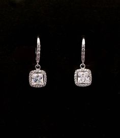 Tarnish resistant rhodium silver plated metal framed square princess cut AAA quality clear white cubic zirconia drop with rhodium sterling silver lever back hoop earrings decorated with cubic zirconia. Matching necklace and bracelet available and sold separately.  https://www.etsy.com/listing/532815570/wedding-jewelry-bridesmaid-bridal?ref=shop_home_active_2 Size: 2.5cm x 0.9cm Returns and exchange details   Customer Satisfaction Guarantee: Below policy will replace standard ETSY policy- please Wedding Bridesmaid Jewelry, Jewelry Bridesmaid, Wedding Bridal Jewellery, White Square, Wedding Jewelry Earrings, Clear White, Diamond Drops, Matching Necklaces, Bridesmaid Gift