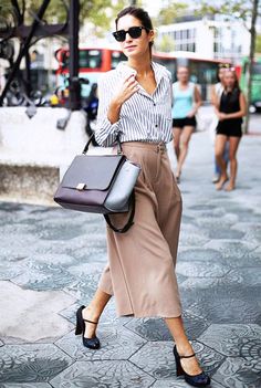 EXPLORE: street style, work, heels, shirt, button-down shirt, sunglasses, handbag, striped shirt, black heels, pumps How To Wear Culottes, Gala Gonzalez, Mode Tips, Walking Down The Street, Blurred Lines, Style Rules, Rock Outfit, Blazer Outfit, Summer Work Outfits