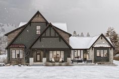 a house is shown with snow falling on the ground